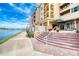 Restaurant entrance with steps and lake views at 424 Luna Bella Ln # 222, New Smyrna Beach, FL 32168