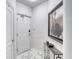Bright entryway with marble floors and modern console table at 424 Luna Bella Ln # 222, New Smyrna Beach, FL 32168