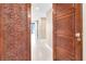 Intricate wooden doors leading inside at 2200 N Atlantic Ave # 1602, Daytona Beach, FL 32118