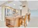 Updated kitchen with granite countertops and breakfast bar at 2200 N Atlantic Ave # 1602, Daytona Beach, FL 32118