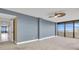 Spacious bedroom with ocean view and ceiling fan at 2200 N Atlantic Ave # 1602, Daytona Beach, FL 32118