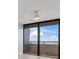Stunning ocean view from this condo's living space, featuring sliding glass doors to a balcony at 2200 N Atlantic Ave # 1602, Daytona Beach, FL 32118