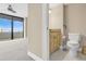 Convenient bathroom with toilet and vanity at 2200 N Atlantic Ave # 1602, Daytona Beach, FL 32118