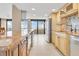 Modern kitchen with granite counters, stainless steel appliances, and ocean view at 2200 N Atlantic Ave # 1602, Daytona Beach, FL 32118