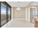 Open dining area with ocean views and access to balcony at 2200 N Atlantic Ave # 1602, Daytona Beach, FL 32118