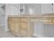 Bathroom with light wood vanity and granite countertop at 2200 N Atlantic Ave # 1602, Daytona Beach, FL 32118
