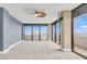Bedroom with ocean view and sliding glass doors to balcony at 2200 N Atlantic Ave # 1602, Daytona Beach, FL 32118
