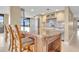 Well-equipped kitchen with breakfast bar and granite countertops at 2200 N Atlantic Ave # 1602, Daytona Beach, FL 32118