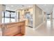 Open kitchen with island, granite counters and stainless steel appliances at 2200 N Atlantic Ave # 1602, Daytona Beach, FL 32118