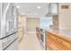 Modern kitchen with stainless steel appliances and granite countertops at 2200 N Atlantic Ave # 1602, Daytona Beach, FL 32118