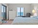 Main bedroom with ocean view, dresser, and comfortable seating at 1275 Ocean Shore Blvd # 308, Ormond Beach, FL 32176