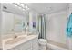 Updated bathroom with subway tile and a spacious vanity at 1510 Ocean Shore Blvd # 3150, Ormond Beach, FL 32176
