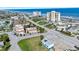 Aerial view of coastal property, showcasing nearby ocean and buildings at 1510 Ocean Shore Blvd # 3150, Ormond Beach, FL 32176