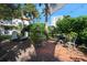 Brick patio with seating area and a fountain at 1510 Ocean Shore Blvd # 3150, Ormond Beach, FL 32176