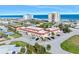 Aerial view of oceanfront building with ample parking and ocean views at 1510 Ocean Shore Blvd # 3150, Ormond Beach, FL 32176
