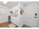 Bright white kitchen with stainless steel appliances and quartz countertops at 1510 Ocean Shore Blvd # 3150, Ormond Beach, FL 32176