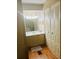 Clean bathroom with vanity, storage, and flooring at 216 Rue De Paresse, Tavares, FL 32778