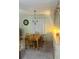 Cozy dining area with a wooden table and built-in cabinetry at 216 Rue De Paresse, Tavares, FL 32778