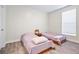 Bedroom with twin beds and plenty of natural light at 280 Celebration Blvd # 203, Celebration, FL 34747