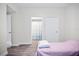 Bedroom with a bed and access to a bathroom at 280 Celebration Blvd # 203, Celebration, FL 34747