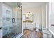 Modern bathroom with a large walk-in shower and tile flooring at 280 Celebration Blvd # 203, Celebration, FL 34747