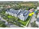 Aerial view showcasing building location and landscaping at 280 Celebration Blvd # 203, Celebration, FL 34747