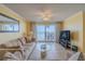 Living room boasts ocean views and comfy furniture at 1183 Ocean Shore Blvd # 6040, Ormond Beach, FL 32176