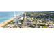 Aerial view showcasing beachfront location and building at 1183 Ocean Shore Blvd # 6040, Ormond Beach, FL 32176