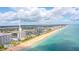 Aerial view showcasing oceanfront property and surrounding neighborhood at 1183 Ocean Shore Blvd # 6040, Ormond Beach, FL 32176