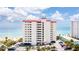 Oceanfront building, parking lot, and partial beach view at 1183 Ocean Shore Blvd # 6040, Ormond Beach, FL 32176