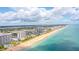 Aerial view showcasing oceanfront property and surrounding neighborhood at 1183 Ocean Shore Blvd # 6040, Ormond Beach, FL 32176