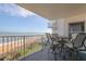 Balcony with ocean view and seating area at 1183 Ocean Shore Blvd # 6040, Ormond Beach, FL 32176