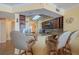 Kitchen breakfast bar with seating for two at 1183 Ocean Shore Blvd # 6040, Ormond Beach, FL 32176