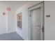 Apartment hallway with door and window at 1183 Ocean Shore Blvd # 6040, Ormond Beach, FL 32176
