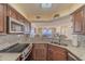 Kitchen with stainless steel appliances and granite countertops at 1183 Ocean Shore Blvd # 6040, Ormond Beach, FL 32176