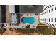 Aerial view of community pool and building at 1415 Ocean Shore Blvd # B030, Ormond Beach, FL 32176