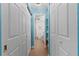 Clean bathroom with walk-in shower and ample storage at 1415 Ocean Shore Blvd # B030, Ormond Beach, FL 32176