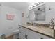 Updated bathroom featuring granite countertop and walk-in shower at 1415 Ocean Shore Blvd # B030, Ormond Beach, FL 32176