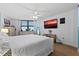 Spacious main bedroom with king-size bed and ocean views at 1415 Ocean Shore Blvd # B030, Ormond Beach, FL 32176
