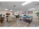 Community recreation room with pool table and ping pong at 1415 Ocean Shore Blvd # B030, Ormond Beach, FL 32176