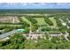 Community overview: homes, golf course, pool, and tennis courts at 3404 Rexford Cir, Ormond Beach, FL 32174