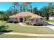 Aerial view of single-Gathering home with landscaped yard at 3404 Rexford Cir, Ormond Beach, FL 32174