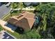 An aerial view of the home showing the roofline and solar panels at 3404 Rexford Cir, Ormond Beach, FL 32174