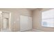 Bedroom with neutral wall paint, carpet flooring, and a closet at 3404 Rexford Cir, Ormond Beach, FL 32174