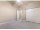 Bedroom with neutral walls, carpet, and double-door closet at 3404 Rexford Cir, Ormond Beach, FL 32174