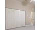 Bedroom with four-door closet and neutral wall paint at 3404 Rexford Cir, Ormond Beach, FL 32174