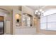 Elegant dining area with built-in cabinetry and a beautiful chandelier at 3404 Rexford Cir, Ormond Beach, FL 32174