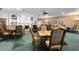 Casual dining area with fireplace and bookshelves at 3404 Rexford Cir, Ormond Beach, FL 32174