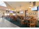 Casual dining area with wood chairs and tables at 3404 Rexford Cir, Ormond Beach, FL 32174