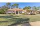 Single-story home with stucco exterior, tile roof, and landscaped yard at 3404 Rexford Cir, Ormond Beach, FL 32174